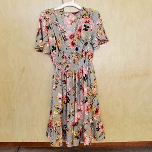 Fun summer dress.So Cute. Better in person. Petite. Floral Flowing V neck dress.